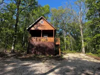 Cowboy Cabin is a quiet place to camp in the woods with the amenities of home.