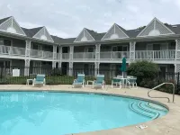 Relax and get away! Beautiful upscale condo with pool near OGT Village and Beach