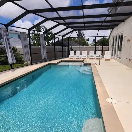 Beautiful two-story single family beach home with a private pool and ocean views