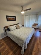 Cozy canal front house with its own boat ramp and dock. Amazing waterfront view.