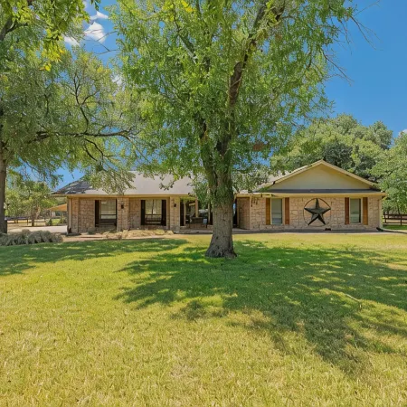 Beautiful Pool home on 2.5 acres with a serene country feel with urban location