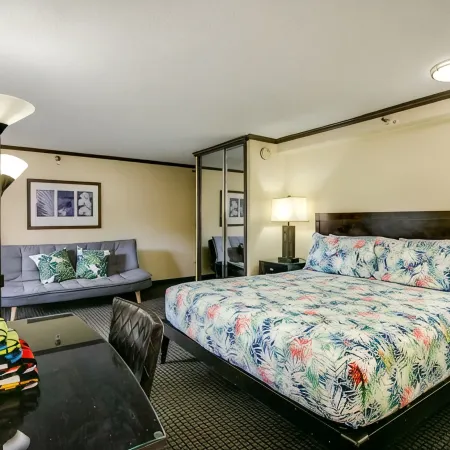 Queen Bed Suite Balcony Suite over Pool at the Gorgeous Bamboo Waikiki complex