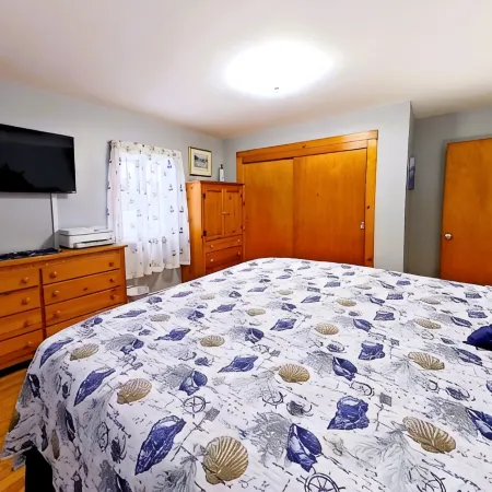 Johnson Homestead. One level living, ocean view with semi-private beach access.