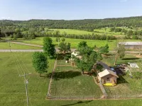 Historic Early Settler Farm House that Has Been Modernized For Your Comfort.