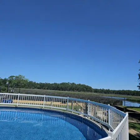 HotTub/Fish/RIVER FRONT/DOGS/SUMMER POOL.RIGHT BY GULF AND BEACHES. BRING BOAT!