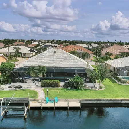 RUM CAY GETAWAY: South facing waterfront home, private pool/spa, bar, and dock.