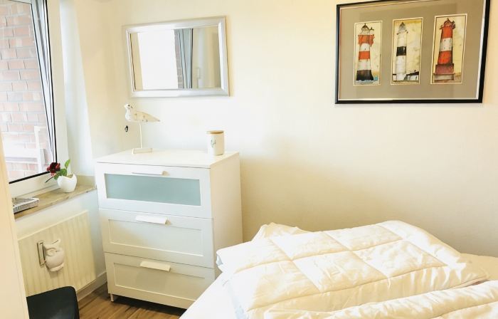 Small holiday apartment in Dornumersiel with a dog