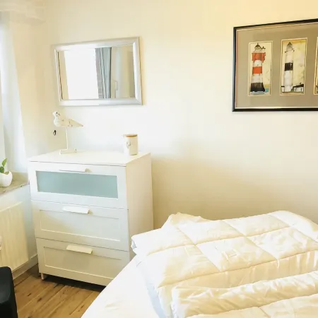 Small holiday apartment in Dornumersiel with a dog
