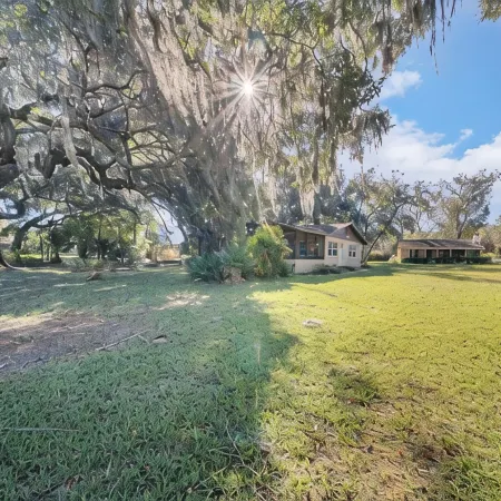 Lakefront home on Lake Kerr near Salt Springs with large porch and great yard