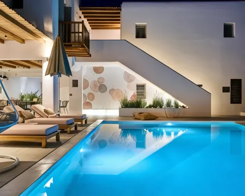 Adorno Beach Hotel and Suites Отели рядом с достопримечательностью «Пляж Орнос»