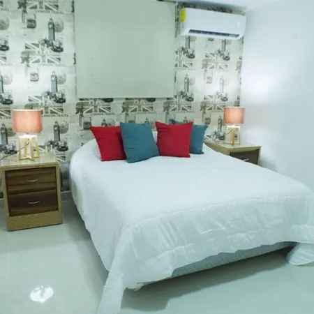 Malecon Premium Rooms & Hotel