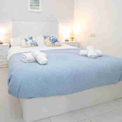 Luminoso apartamento a un paso de la playa Rooms