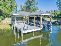 Beautiful lake front cottage, deep water lot with covered dock and amenities. - 4-Star