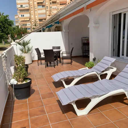 Charming Beachfront Bungalow in Torrox Costa - Perfect Family Retreat