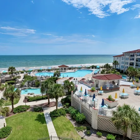 Breathtaking ocean views, resort-style pools, onsite restaurant, steps to beach.