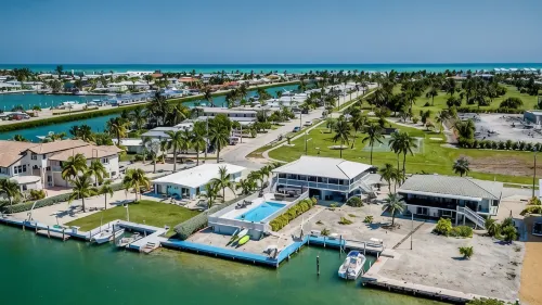 Watch dolphins play in Shelter Cove while swimming in our oversized  pool - Wifi