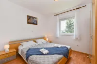 Bright apartment in Medolino - 2-Star