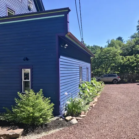 Upscale King Suite with Purple Mattress and reserved off-street parking