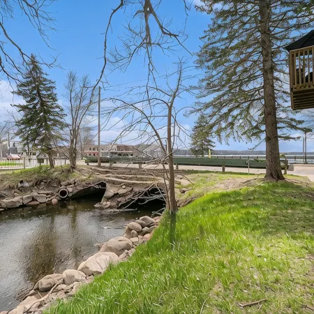Downtown Boyne City charmer with stunning Lake Charlevoix and Boyne River views.