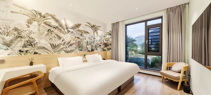 Muqi Jiushe Design B&B (Longyan Railway Station Minxi Trading City) Ξενοδοχεία στην πόλη Λόνγκιαν