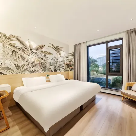 Muqi Jiushe Design B&B (Longyan Railway Station Minxi Trading City)