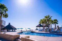 Oceanfront ground level condo on a Private Beach in a lovely resort!