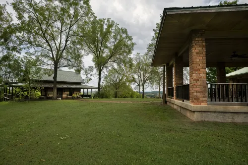 Historic Log Cabin on 200 acre farm, pasture and forest with panoramic views!