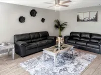 Beautiful Home in quiet neighborhood with a pool and close to stores & highways.