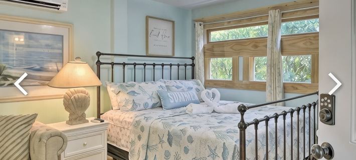First floor bedroom kitchenette/full bathroom / Dinning / seating sofa turn bed Hotels in Nags Head