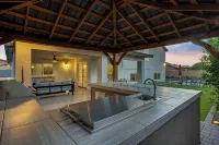 NEW! Luxe Vacation Getaway - heated pool and putting green - 4-Star