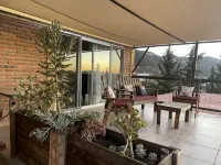 3 comfortable individuals cabins in a property with stunning views of the valley