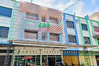 JOY GuestHouse Pekanbaru Mitra RedDoorz Các khách sạn ở Payung Sekaki