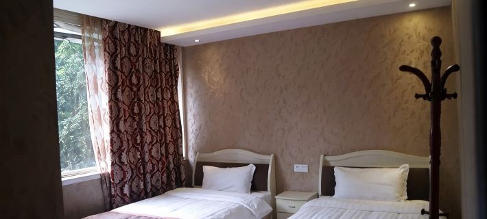 Guyu Yaxin Business Hotel Hotels in Gulin