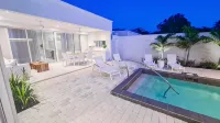 Luxe Private Pool Villa in Porters Place, Exclusive Beach Club Access, Gym & BBQ