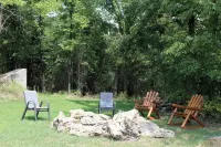 The Stone Schoolhouse - Gated Lakefront Acreage with views and historic charm