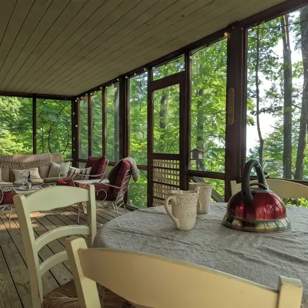 Lakeside Log Cabin with Cozy Stone Fireplace