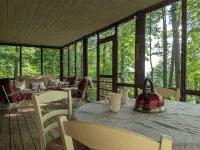 Lakeside Log Cabin with Cozy Stone Fireplace