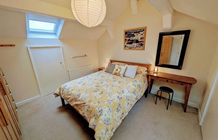 Cosy yet spacious property with private parking, close to the village centre.