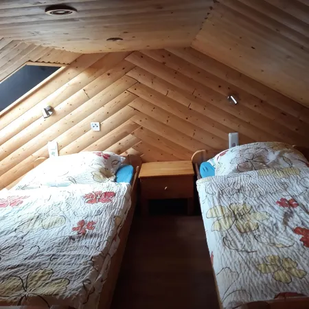 Sunny holiday home with a cozy sleeping loft, idyllically located in the garden.