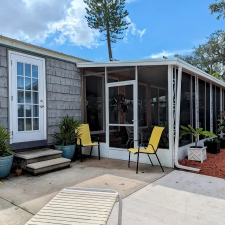 Tropical Privacy, Full Kitchen, Screened Lanai, Covered Parking, Fenced Yard