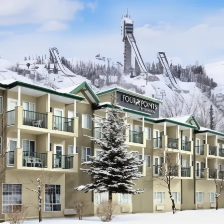 Four Points by Sheraton Hotel & Suites Calgary West Отели рядом с достопримечательностью «Университет Калгари»