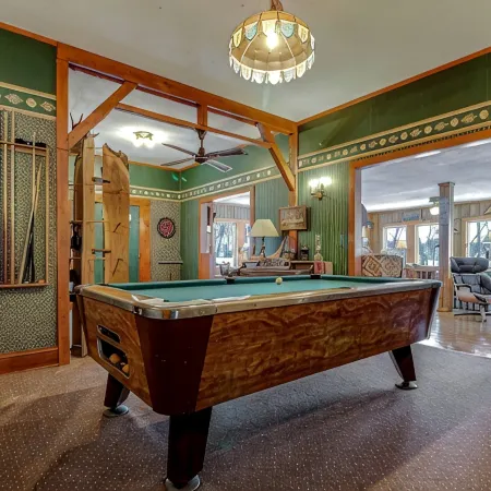 Historic prohibition Lodge next to golf course with private beach