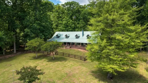 Cabin on 35 acres w/private lake for fishing, fenced yard, hot tub, pool table