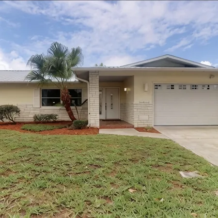 Spacious 3 BR 2 Bath  House On Deep Canal With Screened Heated Pool