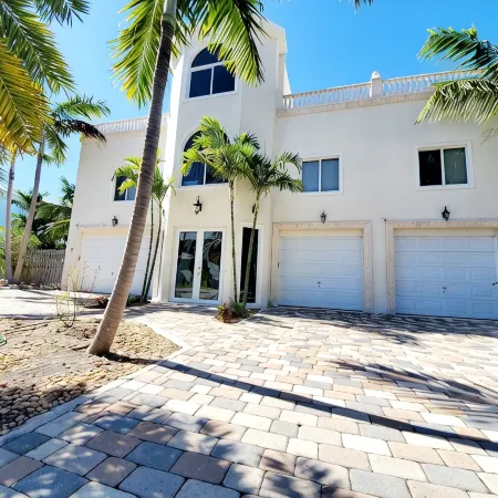 5Br Luxury Home w/ Pool, Theater, Rooftop Deck & 100-ft Dock Near Beach!