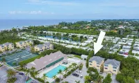 Private townhome steps from the beach and right next to the pool