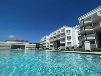Poolside Penthouse on Natural Caribbean Beach - 2-Star