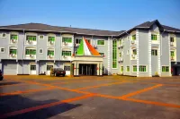 New Point Hotel and Suites Hotels near Sufficient Grace Worship Centre