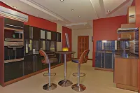 Cowrie Shell Beach Apartments Official