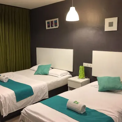 JP Hotel Jalan Stadium Отели рядом с достопримечательностью «Большая часовая башня»